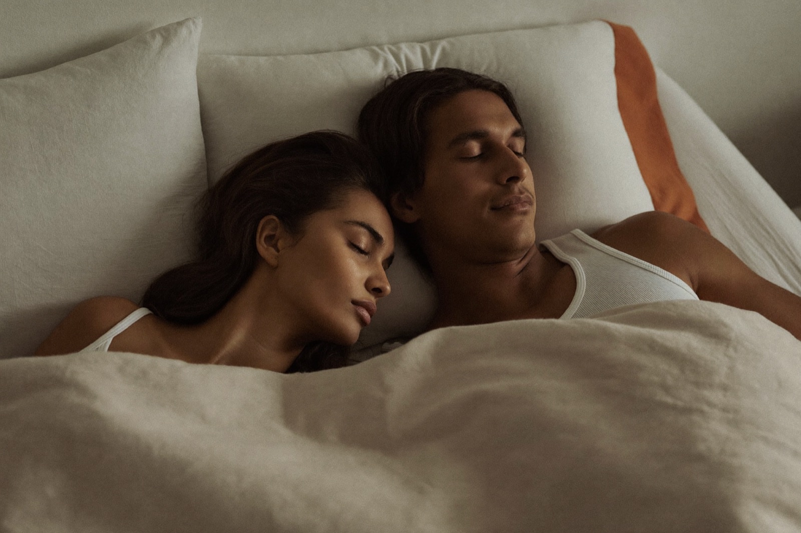 A person resting calmly, suggesting steady, restorative sleep.